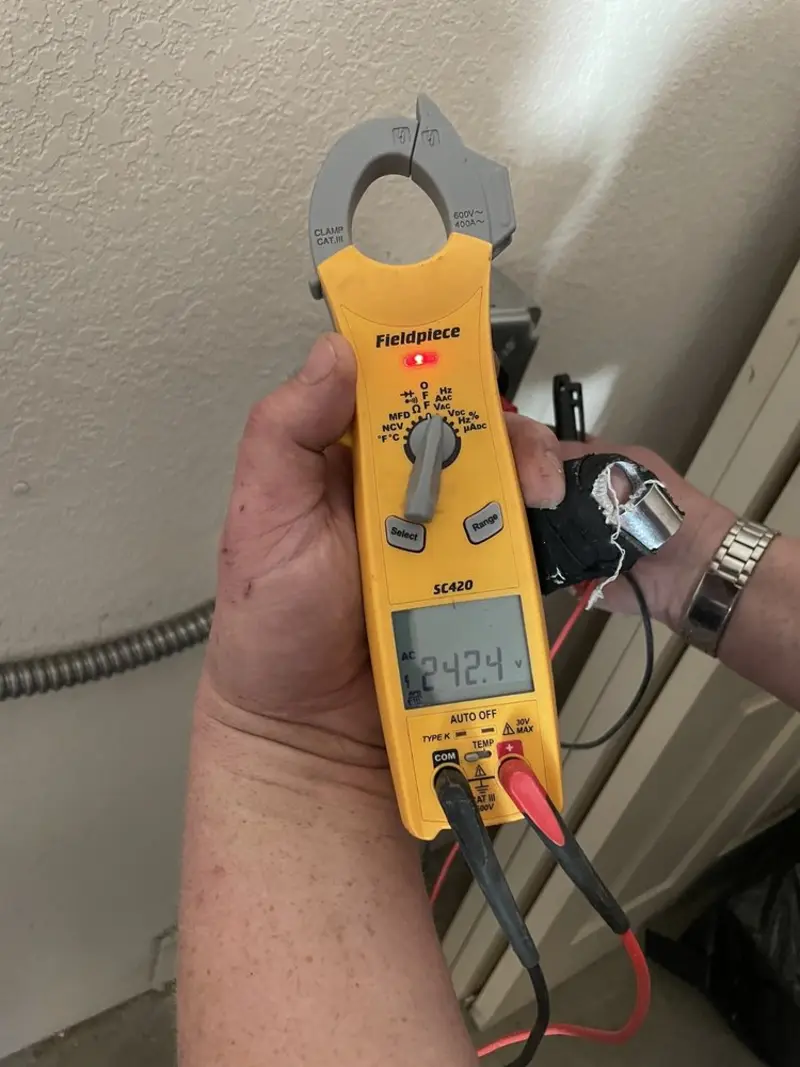 Voltage testing with clamp meter during Circuit Breaker Repair in Rio Rico